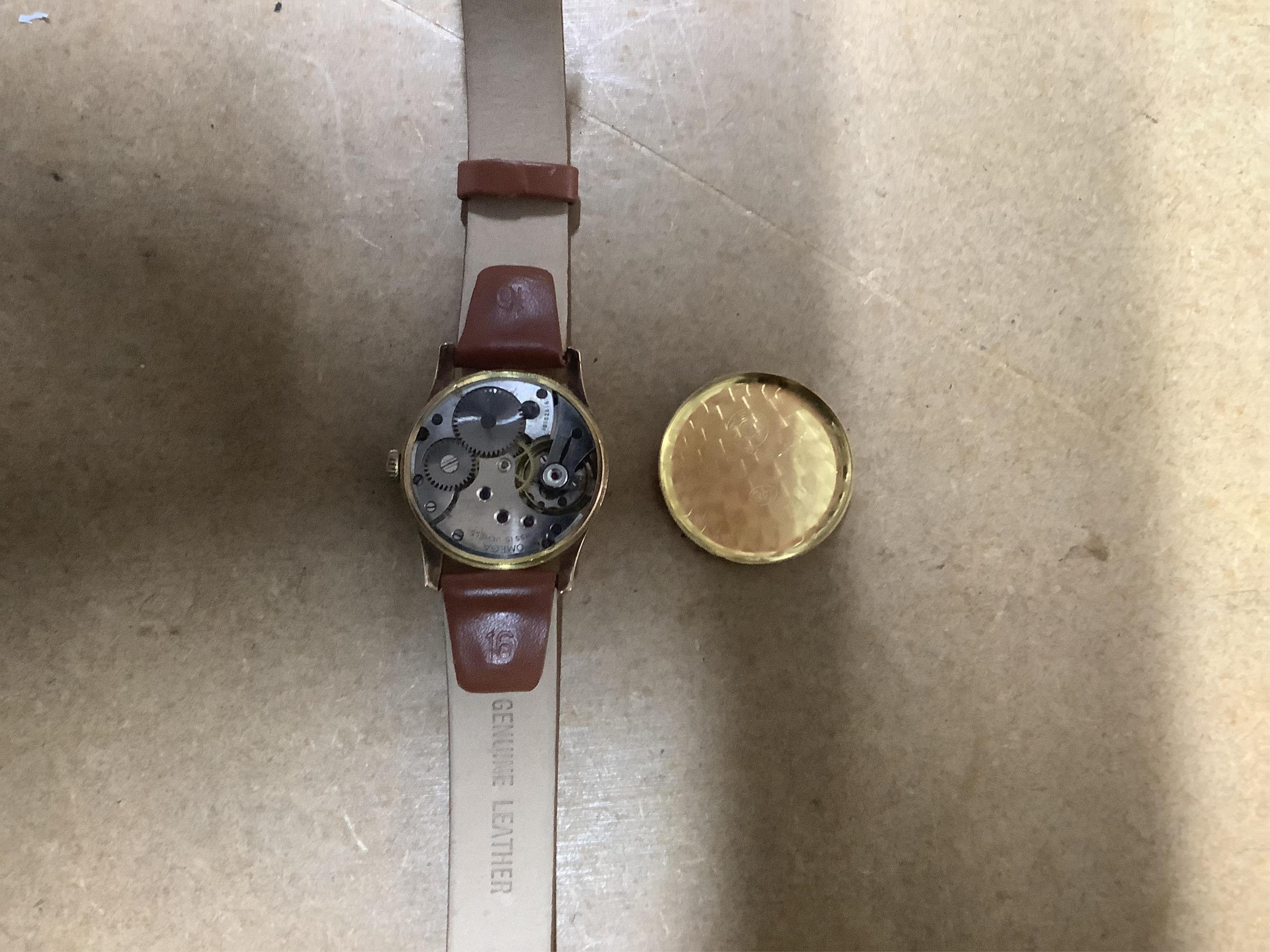 A gentleman's 1940's 9ct gold Omega manual wind wrist watch, on a later associated leather strap